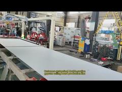 Mesin laminasi papan gipsum dua sisi